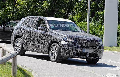 Bmw X Spy Shots Redesigned Suv Spotted For First Time Auto