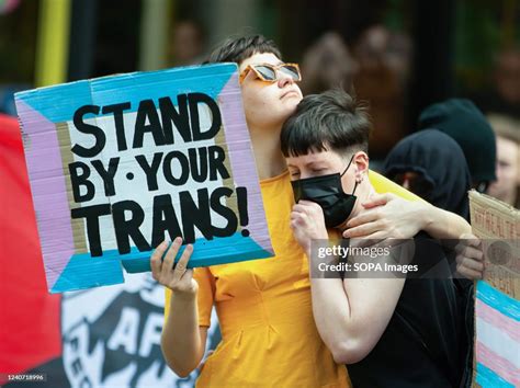 A Pro Trans Protester Holds A Placard Expressing Her Opinion During