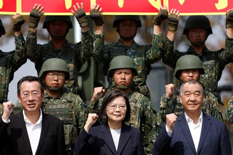 Taiwan president reviews troops ahead of sensitive US visit