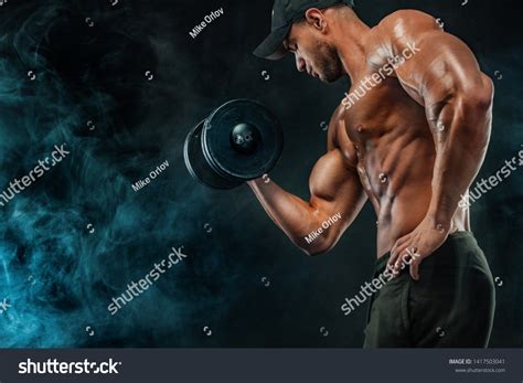 Muscular Fitness Sports Man Atlete Dumbbell Stock Photo