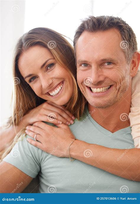 The Perfect Couple Portrait Of A Happy And Affectionate Couple Smiling