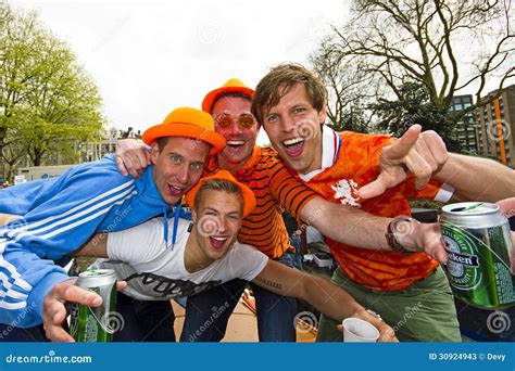 AMSTERDAM, NETHERLANDS - APRIL 30: People In Orange Cruising Thr ...