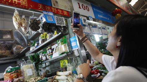 Cashless Society Arrives In China Even Beggars Have A QR Code