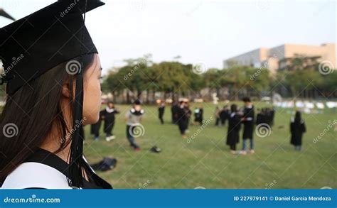 Portrait Of A Happy And Smiles Asian Female Graduate On Graduation Day