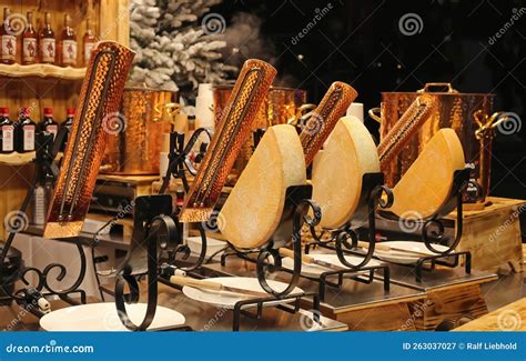 Variety Of Raclette Cheeses At French Christmas Market Stall Stock