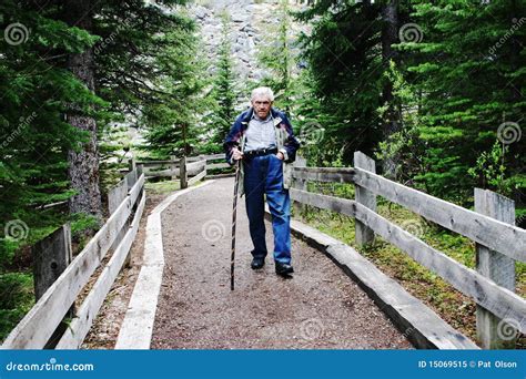 Elderly Gentleman Hiking On A Trail Stock Image Image Of Landscape