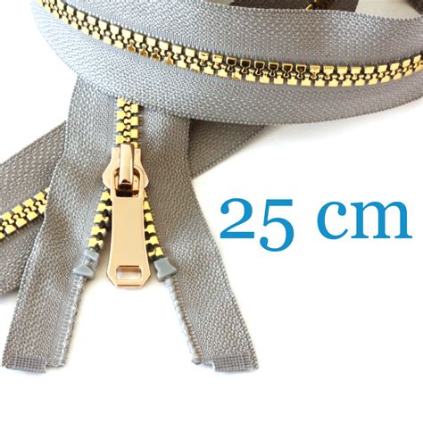 Fermeture éclair métallisée dorée séparable pour vestes 25 cm Snaply