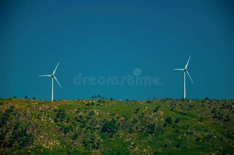 Wind Turbines For Electric Power Generation Over Hill Stock Image