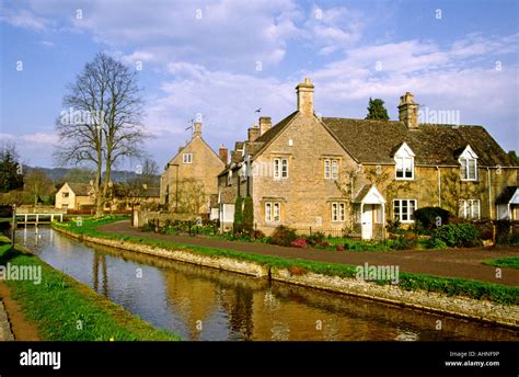 UK Gloucestershire Lower Slaughter River Eye passing through the ...