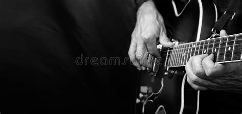 Guitarist Hands And Guitar Close Up Copy Spaces Black And White