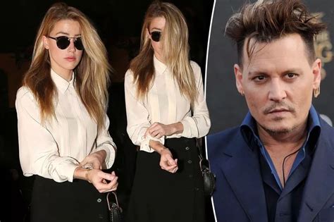 Amber Heard Keeps A Low Profile As She Arrives At Johnny Depp