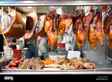 Street Food Vendor Selling Roast Peking Duck And Poultry In The Stock