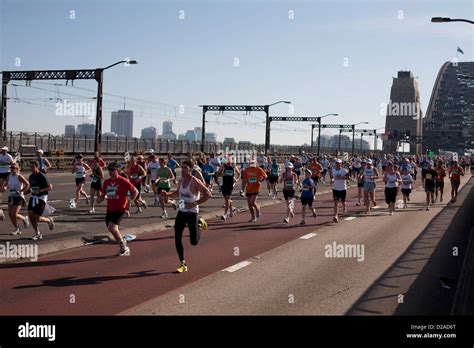 Fitness Enthusiasts Taking Part In The Sydney Charity Fun Run Across