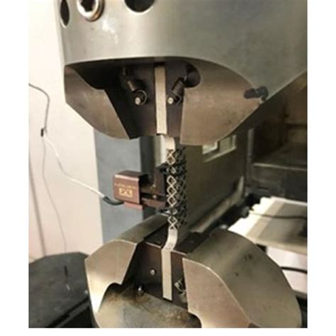 Experimental Setup Of The Uniaxial Tensile Test Download Scientific Diagram