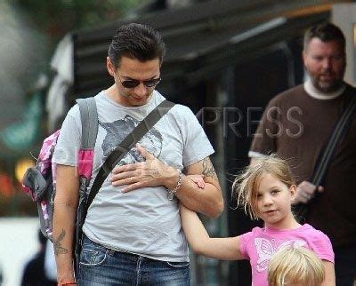 Dave with his daughter Stella. Love the Hello Kitty backpack Dave is carrying. Dave Gahan ...