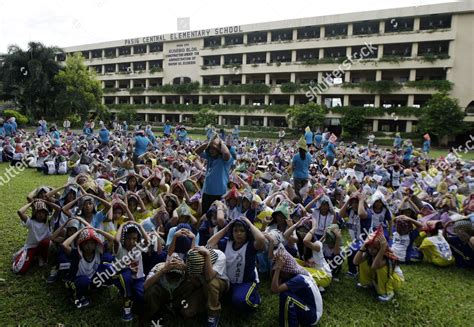 Filipino Grade School Students Protect Their Editorial Stock Photo