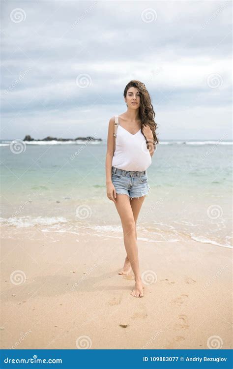 Cute model posing on beach stock image. Image of background - 109883077