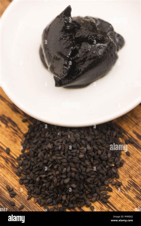 Black sesame paste Stock Photo - Alamy