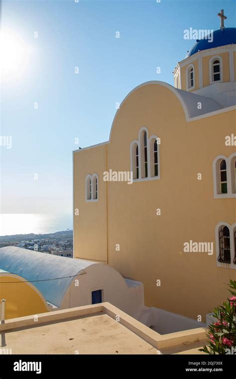 Traditional Blue Domed Greek Orthodox Church In Fira Santorini Greece