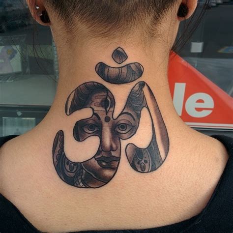 Hinduism style black ink little symbol tattoo on neck - Tattooimages.biz