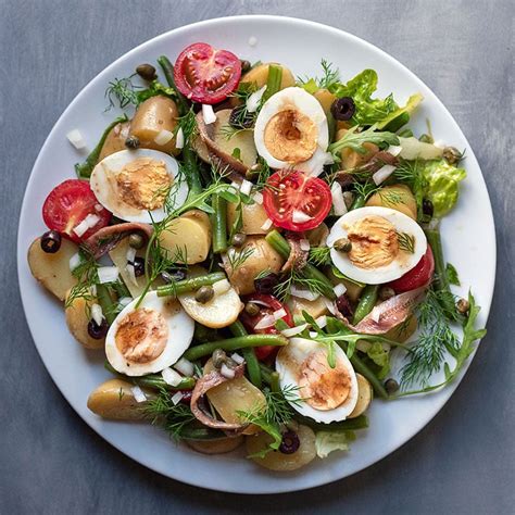 Healthy Mediterranean potato salad with boiled eggs (Nicoise)