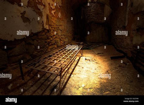 Abandoned prison cell inside Eastern State Penitentiary Stock Photo - Alamy