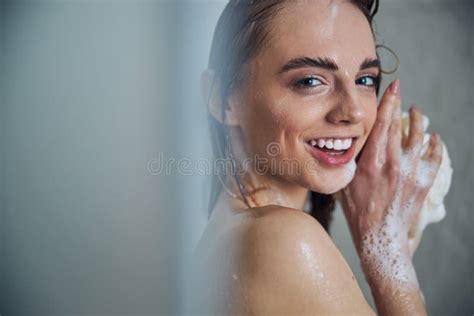 Cute Lady In Bikini Briefs Standing In The Shower Room Stock Photo