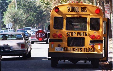 Do I have to stop for a school bus that’s going the other way? – East ...