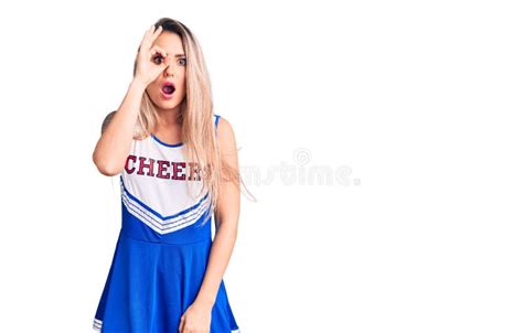 Young Beautiful Blonde Woman Wearing Cheerleader Uniform Doing Ok