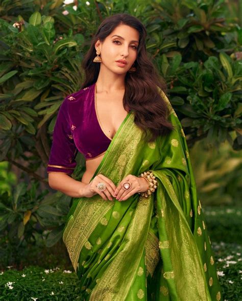 Nora Fatehi Awesome Looks in Green Saree | Telugu Rajyam Photos