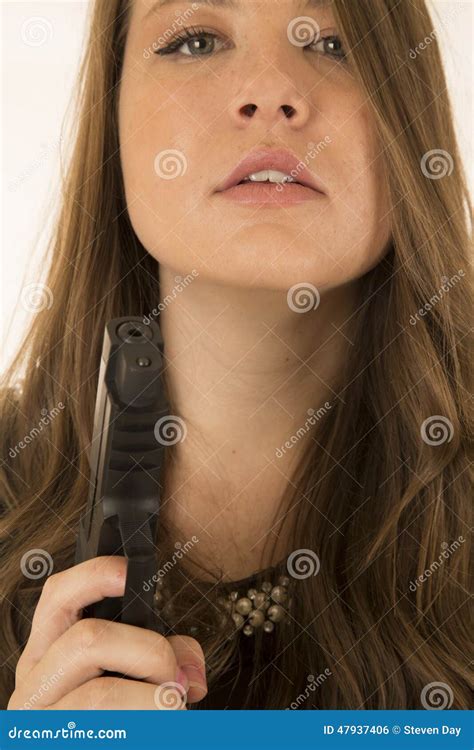 Brunette Woman Holding A Pistol Looking Into Camera Stock Photo Image Of Hands Human 47937406