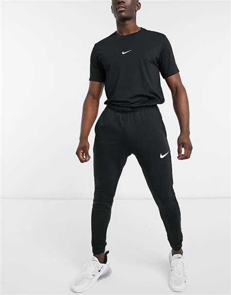 Nike Training Dri Fit Tapered Fleece Joggers In Black Asos