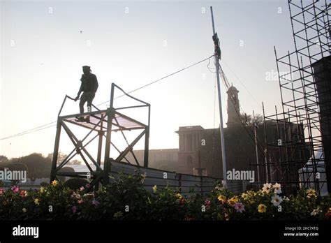 A Painter Gives Final Touch To A Stand Ahead Of The Republic Day Parade