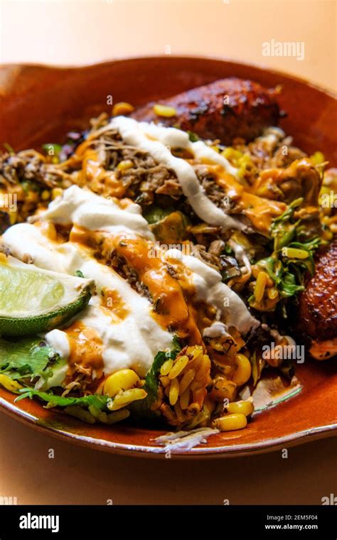 Jamaican Jerk Chicken Rice Bowl With Sweet Plantains And Hot Sauce