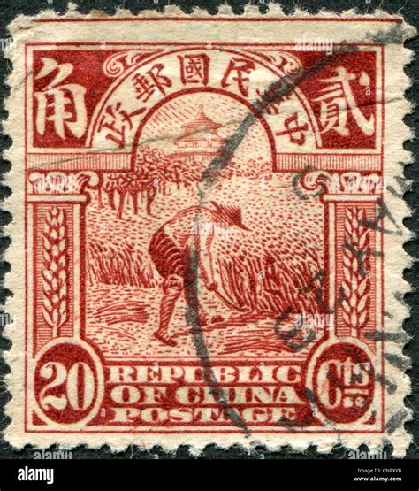 CHINA CIRCA 1913 A Stamp Printed In China Taiwan Is Shown Reaping