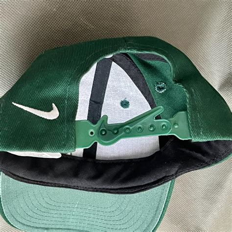 Nike green snapback hat Red swoosh label,... - Depop