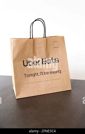 Uber Eats Paper Delivery Bag On Dining Table Stock Photo Alamy