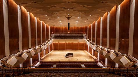 Download A Large Auditorium With Wooden Walls And A Piano