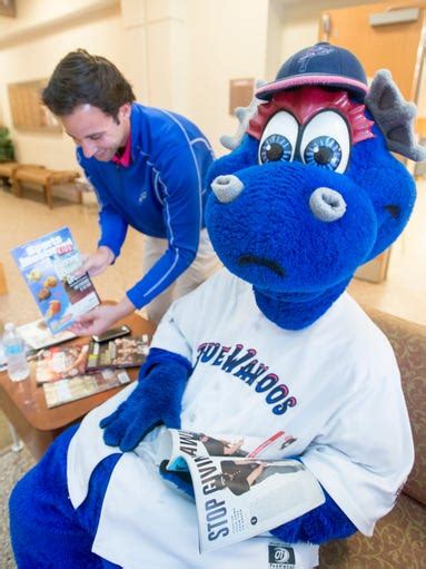 Blue Wahoos mascot Kazoo celebrates Armed Forces Day at VA Clinic