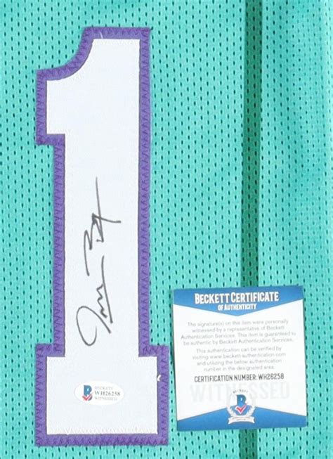 Muggsy Bogues Signed Jersey Beckett Pristine Auction