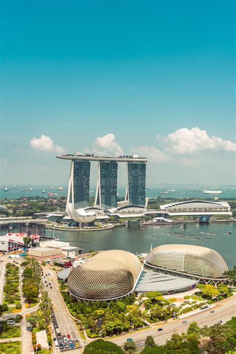 Vertical Shot Of Marina Bay Sands Hotel And The Bay In Singapoe In Blue