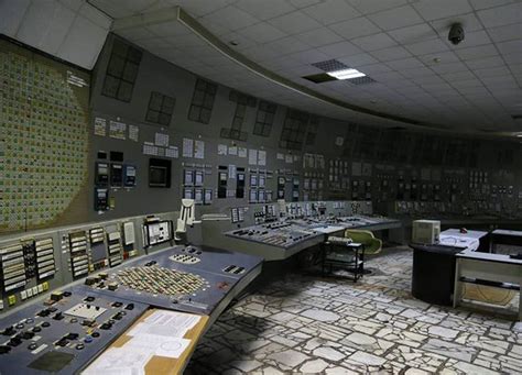 An Old Control Room With Lots Of Buttons And Other Items On The Desks