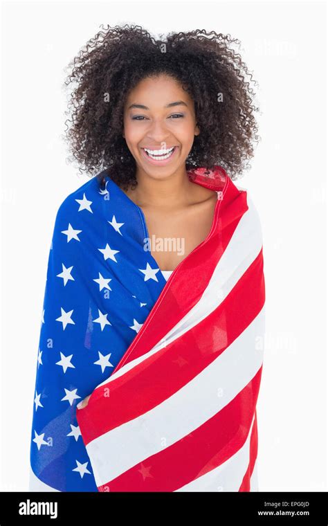 Pretty Girl Wrapped In American Flag Smiling At Camera Stock Photo Alamy