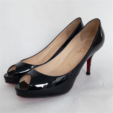 Christian Louboutin Peep Toe Pumps