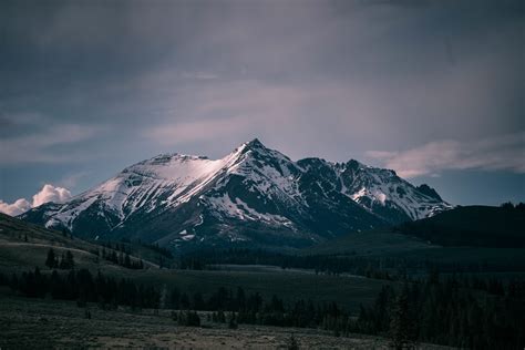 Free Download Hd Wallpaper Snow Covered Mountain During Cloudy Day