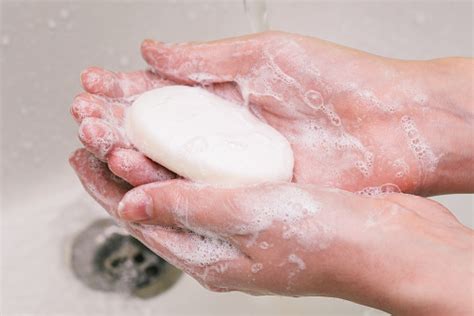 A Man Holds Soap In His Hands Hand Washing With Soap Hands In Soap With