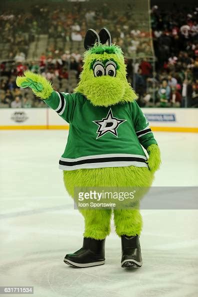 Dallas Stars mascot Victor E. Green waves at the crowd during the ...