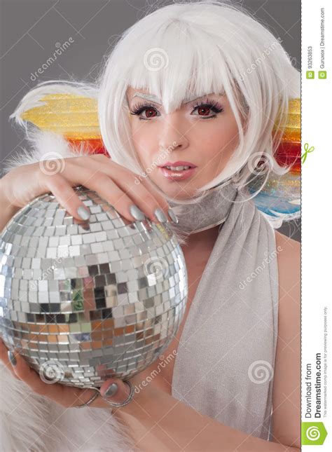 Glamour And Sensual Lady Holding Disco Ball In Luxury Dress Stock Image