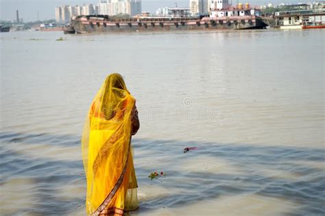 Woman Praying At Ganga Ghat At Kolkata During Chhath Puja Stock Image