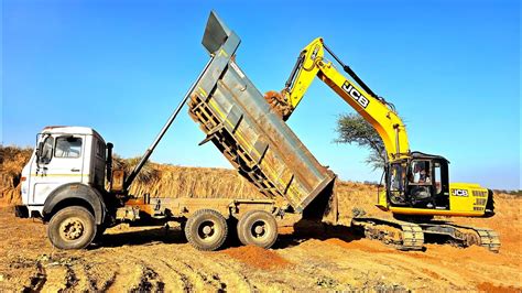 Jcb 210 Excavator Backhoe Machine Loading Mud In Tata Truck 2518